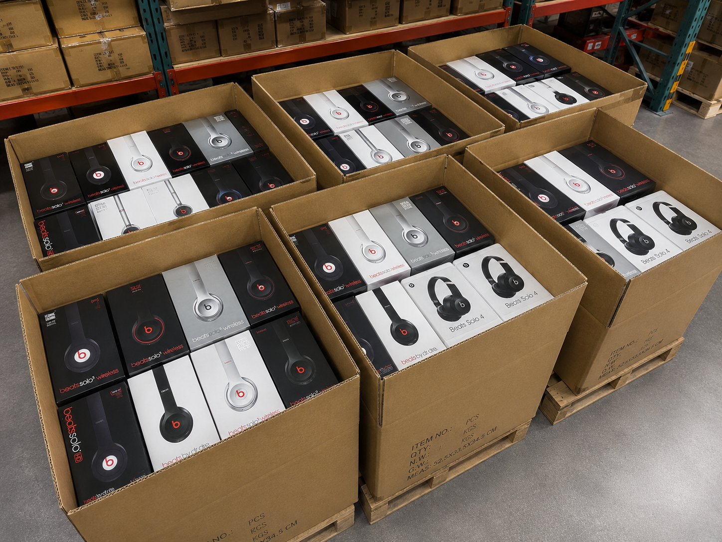 Warehouse cartons filled with Beats headphone retail boxes